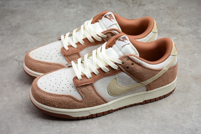 nike dunk low prm “medium curry” dd1390-100