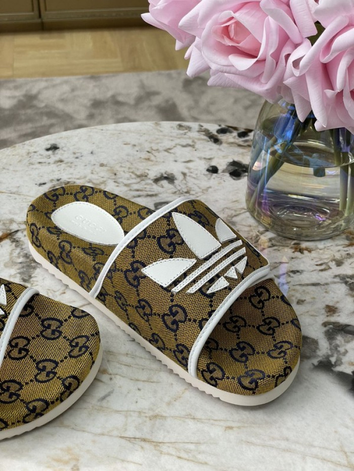 gu x a*d*das sandal
